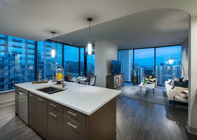 Beautiful condo with floor to ceiling windows and wood floors