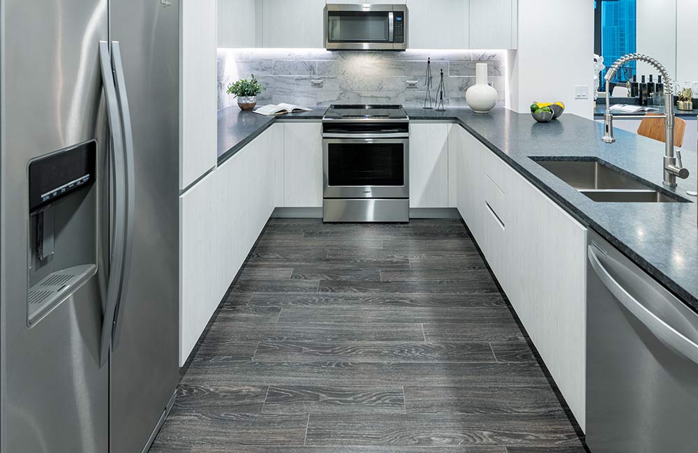 Custom Hardwood Flooring And Cabinetry, White Kitchen With Grey Hardwood Floors